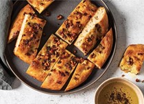 Focaccia with caramelized red onion, pancetta, and oregano
