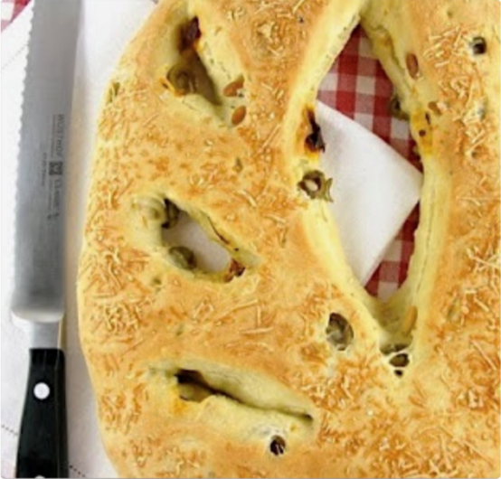 Focaccia with olives, sun-dried tomatoes, & pine nuts