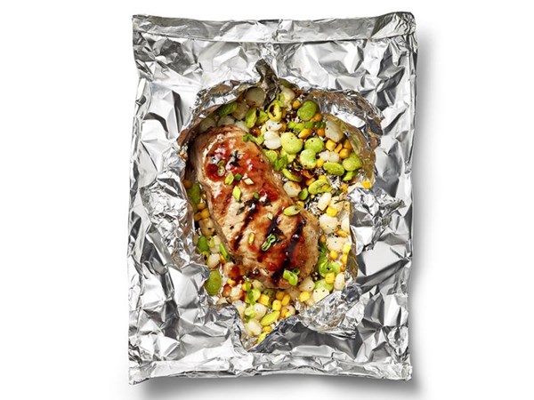 Foil-packet barbecue pork chops with succotash