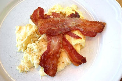 Folden eggs and baked bacon
