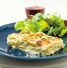 Four-cheese lasagna with artichokes and prosciutto