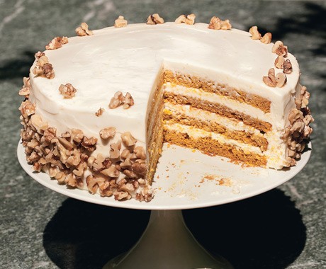 Four-layer pumpkin cake with orange-cream cheese frosting