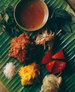 Fragrant beef tartare with pomelo, chilli, lemongrass, roasted rice and pickled green mango