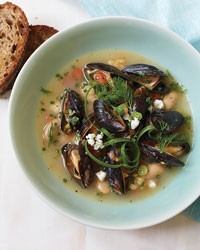 Fragrant gigante beans with garlic confit and mussels