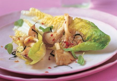 Fragrant mushrooms in lettuce leaves