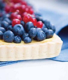 Frangipane tart with blueberries and red currants