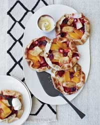 Free-form pineapple, mango and berry tarts