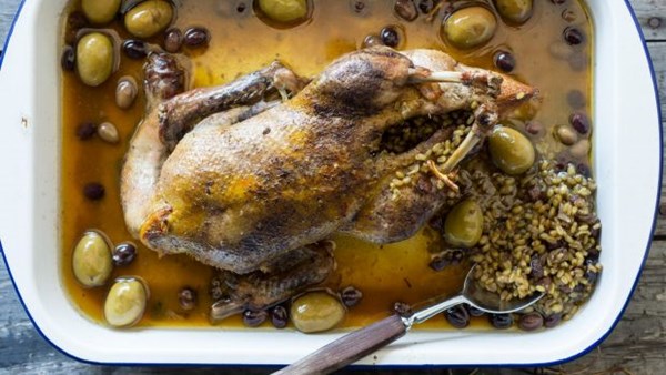 Freekeh-stuffed duck with saffron, olives and preserved lemon