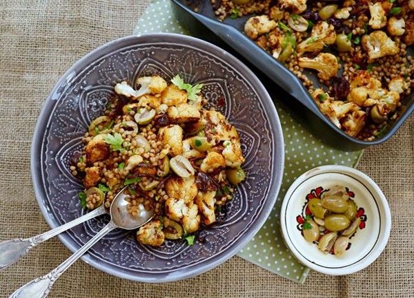 Fregola salad with roast spiced cauliflower, saffron, dates and olives
