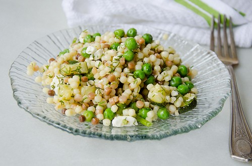 Fregola Sarda with peas, zucchini, feta, and almonds