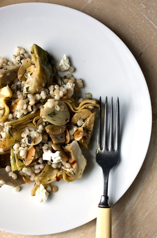 Fregola with artichokes, feta, toasted almonds and herbs