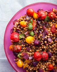 Fregola with charred onions and roasted cherry tomatoes