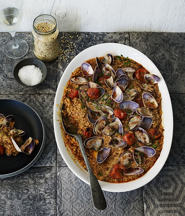 Fregola with pipis and cherry tomatoes
