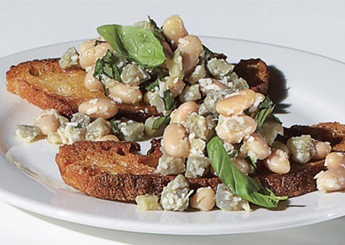Fresh artichoke and white bean crostini