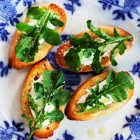 Fresh arugula bruschetta