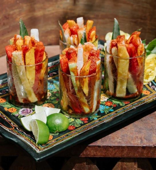 Fresh fruit cups with chamoy and Tajin