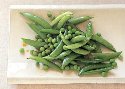 Fresh green peas and sugar snap peas in sesame dressing