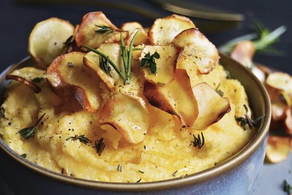 Fresh herb polenta with parsnip chips and maple butter