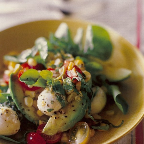 Fresh mozzarella salad with avocado, roasted corn, and grape tomatoes