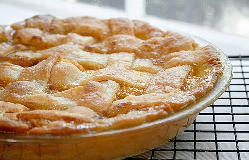 Fresh peach cobbler with nutmeg sauce