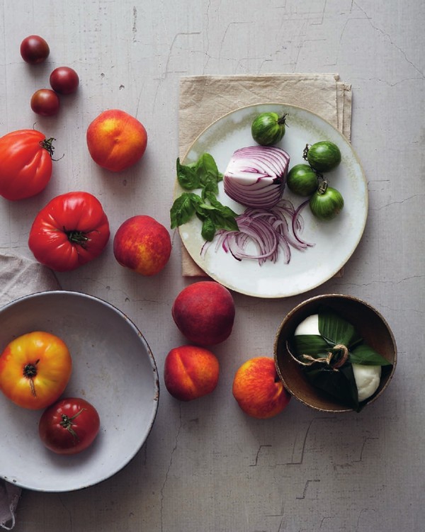 Fresh peaches with heirloom tomatoes and burrata