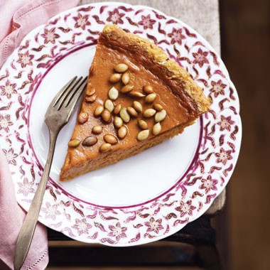 Fresh pumpkin pie with salty roasted pepitas
