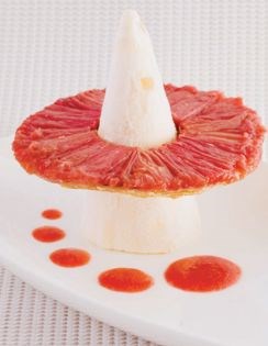 Fresh rhubarb Tatin with ginger ice cream and strawberry rhubarb sauce