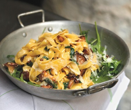 Fresh tagliatelle with chanterelles and lemon zest