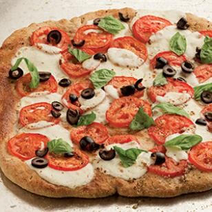 Fresh tomato & black olive pizza