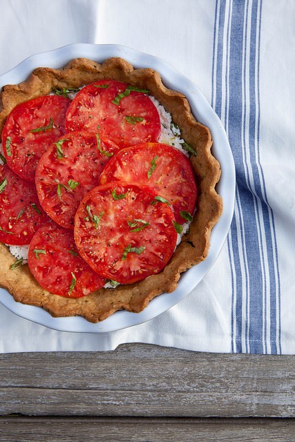 Fresh tomato ricotta pie with garlic herb crust 
