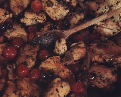 Fricasseed chicken Abruzzi-style with rosemary, white wine, cherry tomatoes and olives