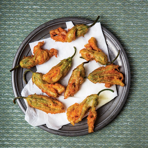 Fried anchovy-stuffed zucchini blossoms