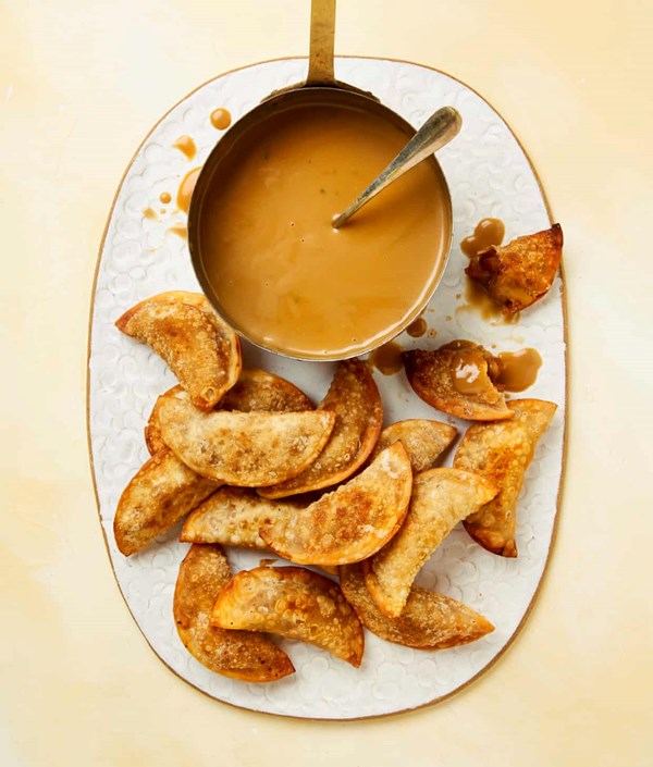 Fried apple dumplings with coconut caramel