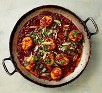 Fried boiled eggs in chilli sauce