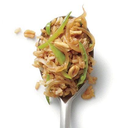 Fried brown rice with snow peas and peanuts