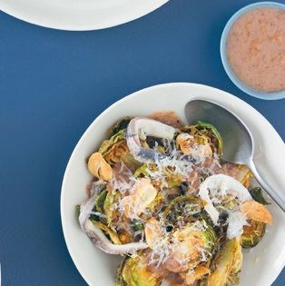 Fried Brussels sprouts w/ white anchovy, walnut, garlic + pecorino