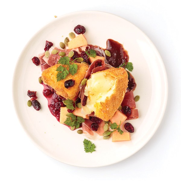 Fried Camembert with ham, melon, and cranberry vinaigrette