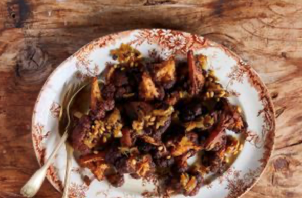 Fried cauliflower with caramelised onion, currants and pine nuts