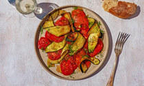 Fried courgette and tomatoes with garlic vinegar