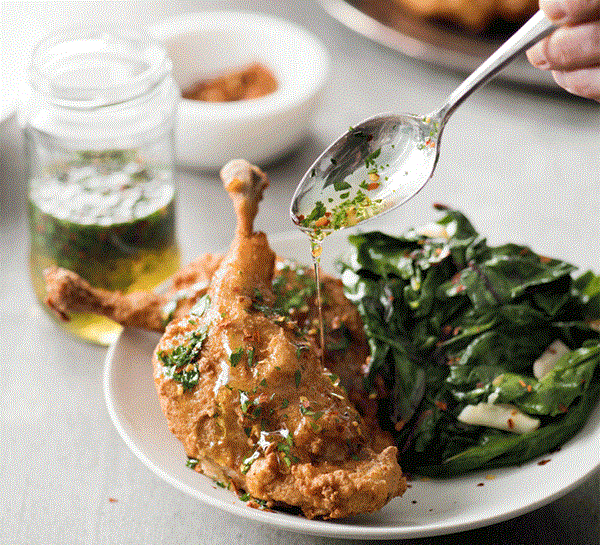 Fried duck confit with eucalyptus honey and mustard greens