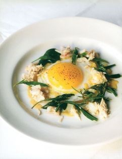 Fried duck's egg with spider crab and sea greens