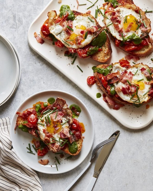 Fried egg breakfast sandwich with tomato confit