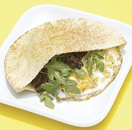 Fried egg pitas with arugula