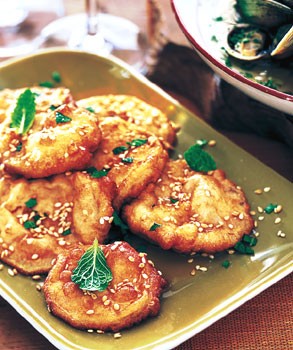 Fried eggplant with honey, mint, and sesame seeds