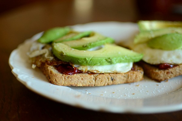 Fried eggs, avocado, and tomato jam