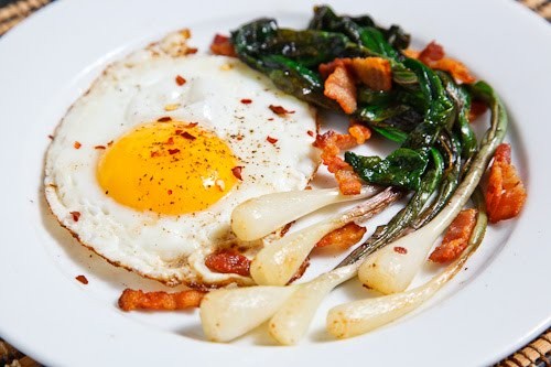 Fried eggs with ramps and bacon