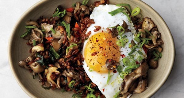 Fried farro with pickled carrots and runny eggs