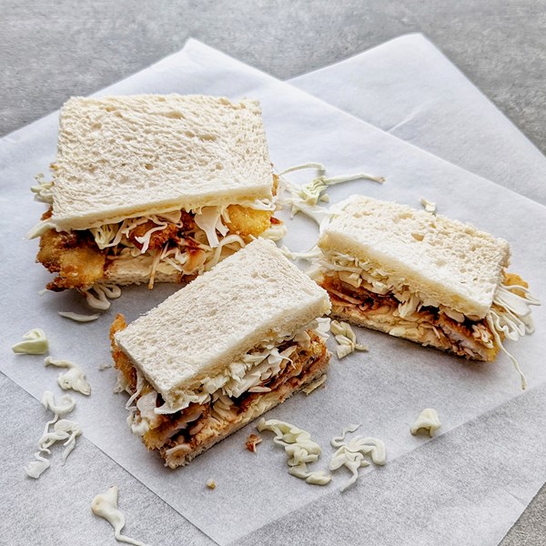 Fried fish sandwich with spicy BBQ sauce (Sakana katsu sando)