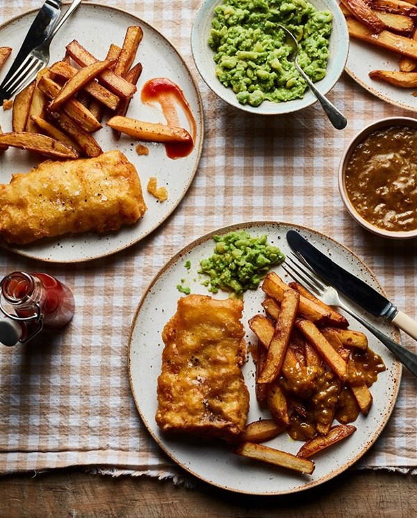 Fried fish with mushy peas