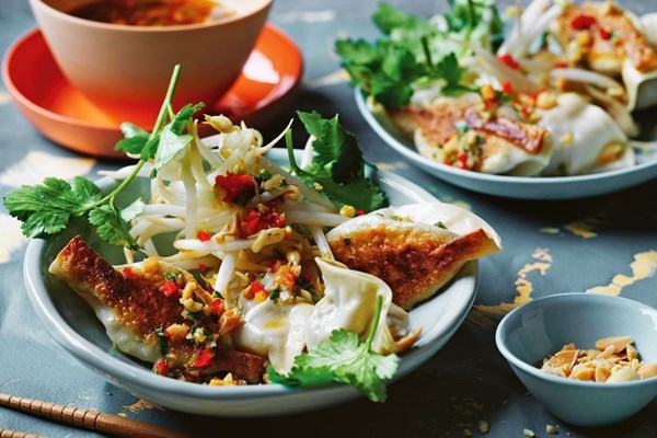 Fried green curry pork dumplings with garlic and peanut nam prik